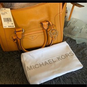 Brand new, with tags, yellow Michael Kors bag.